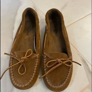Minnetonka slip on moccasins in tan suede.